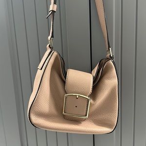 Kate Spade crossbody purse with adjustable strap.